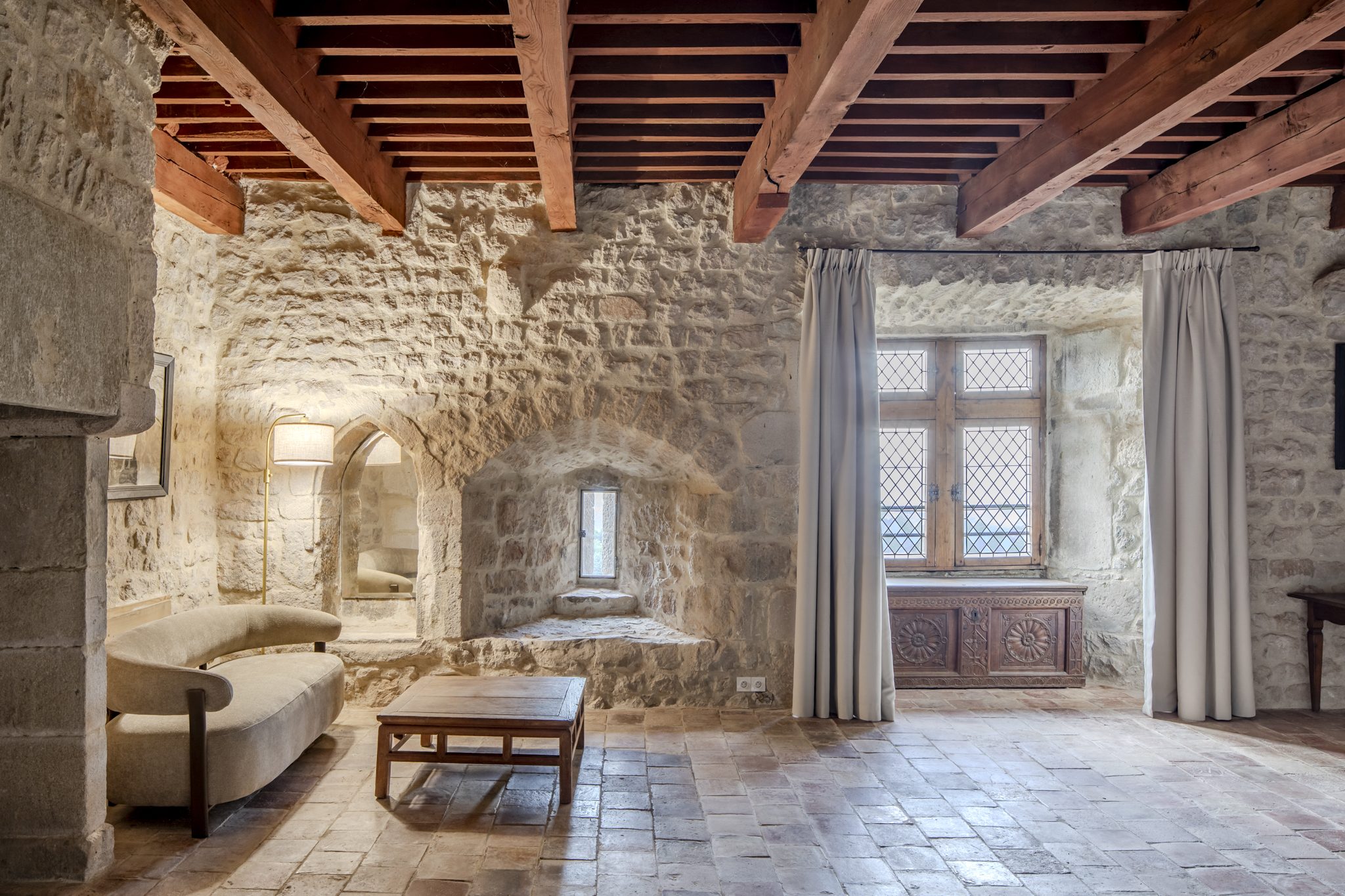Suite aux poutres apparentes et son coin salon